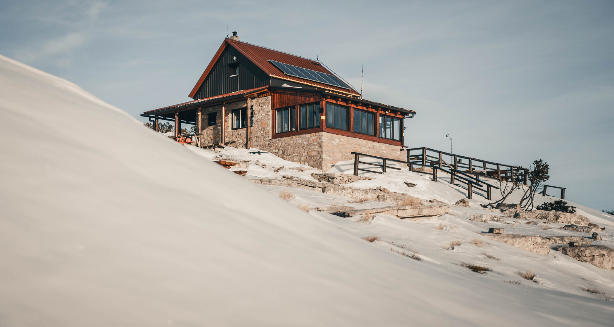 Mountain hut Pume in the winter sunset on Dinara mountain