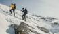 Hike towards peak Sv.Brdo on Velebit mountain during winter snow