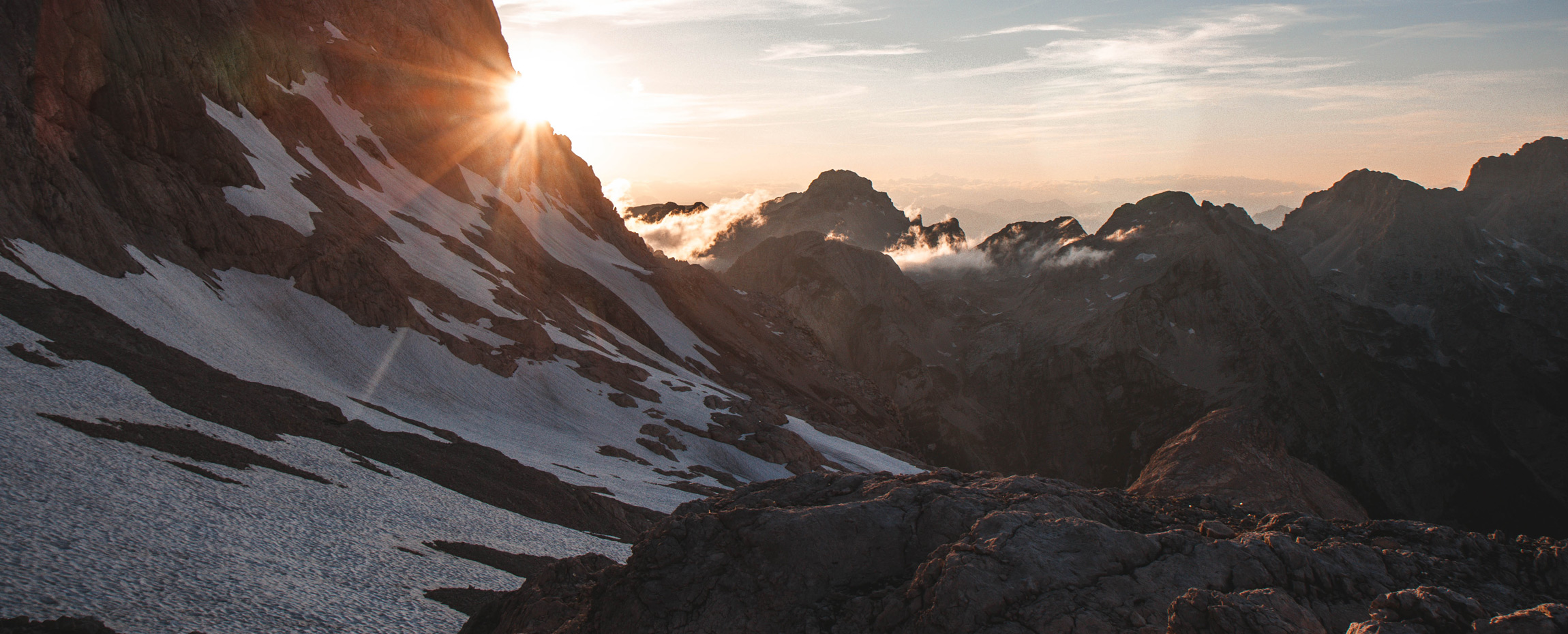 Mountain hut Vodnikov dom under the peak Vernar in Triglav national park